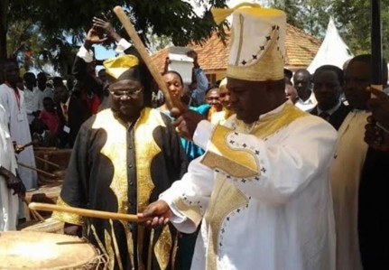 Kamuswaga playing drums